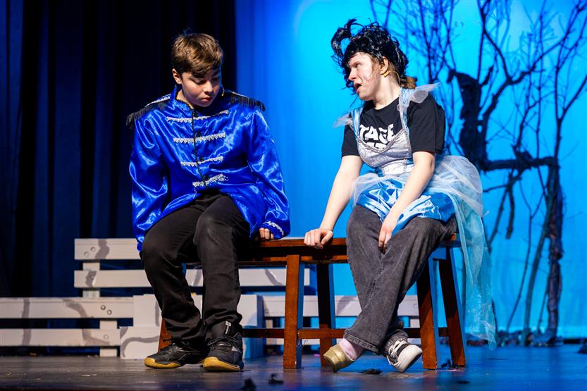 Students perform onstage